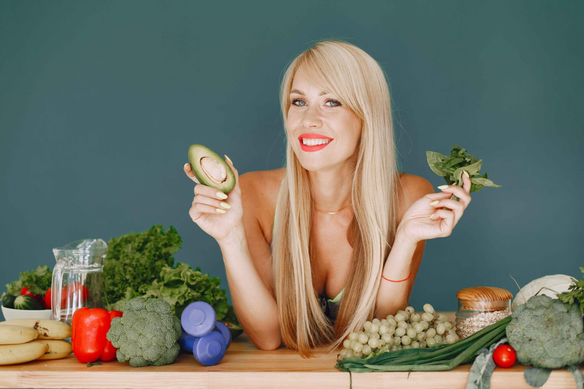 beautiful-girl-make-salad-sporty-blonde-kitchen-woman-with-avocado